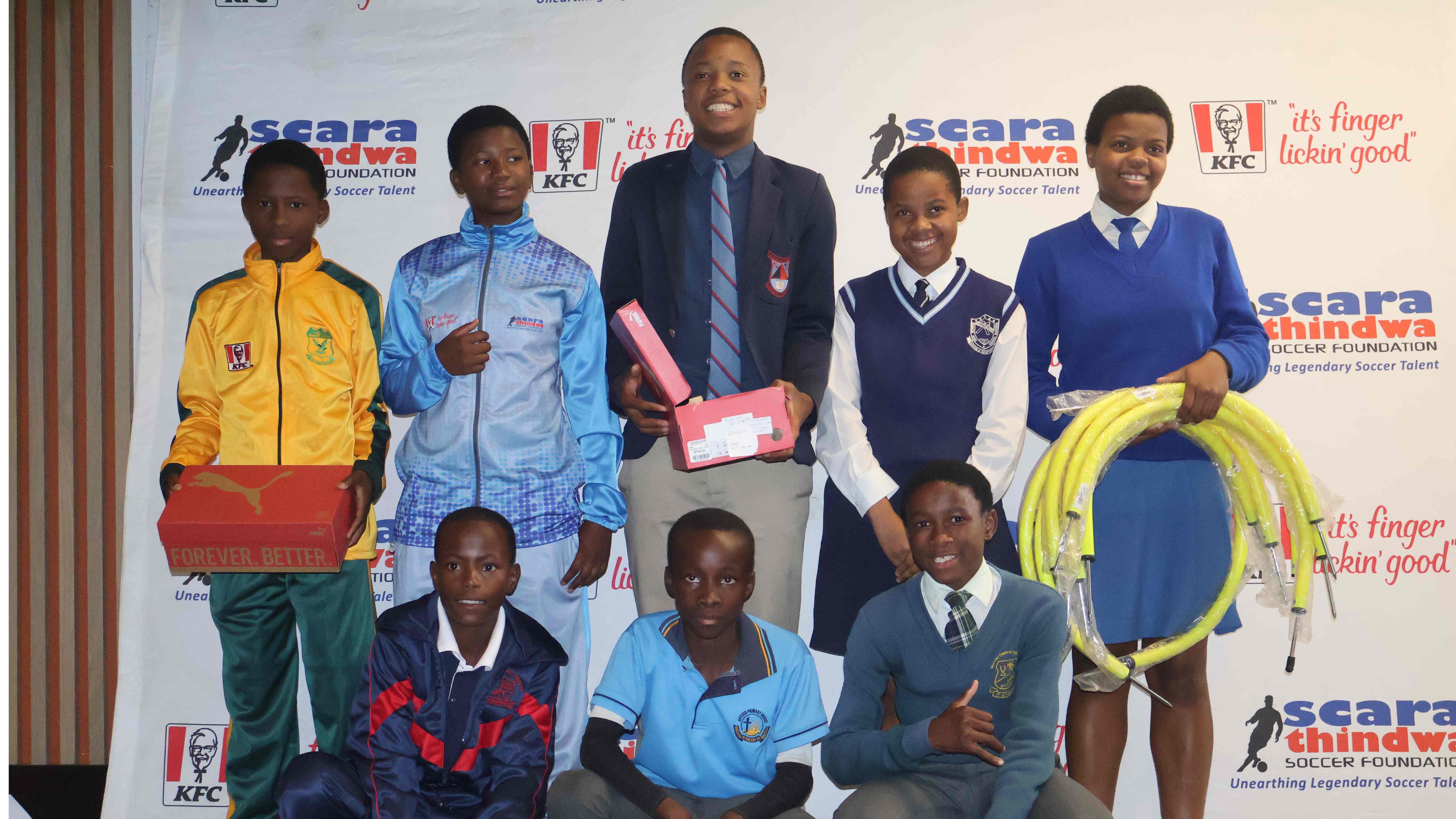KFC’s over E150k soccer equipment for schools